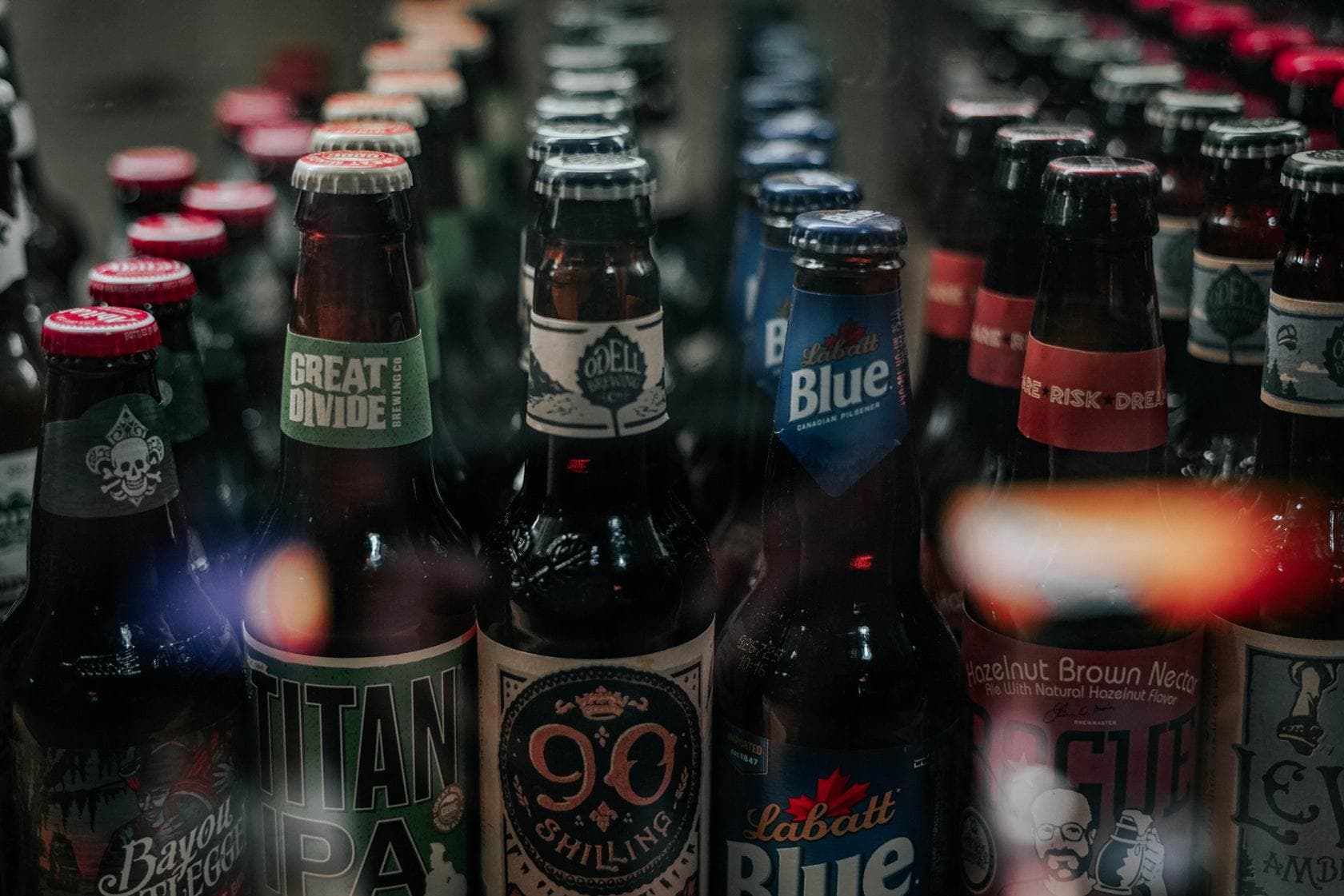 Rows of beer bottles in a cooler